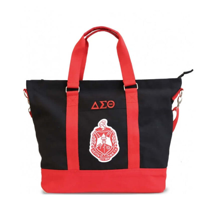 Delta Sigma Theta canvas tote bag with sturdy red handles, showcasing sorority pride and ample storage for everyday use.