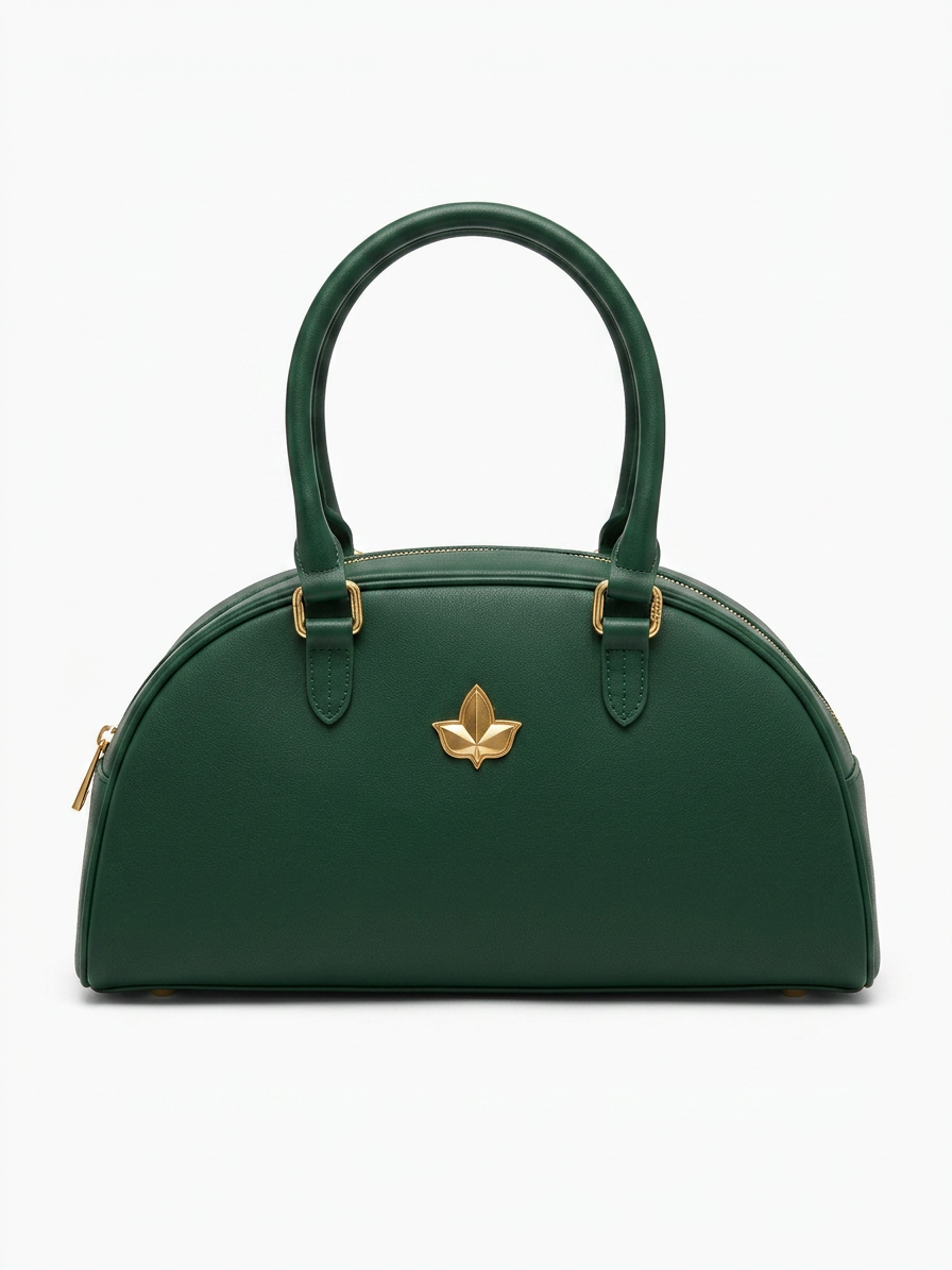 Front view of A&W Heritage Mini Bowler Bag in Ivy Green full-grain leather with brushed gold hardware and structured silhouette