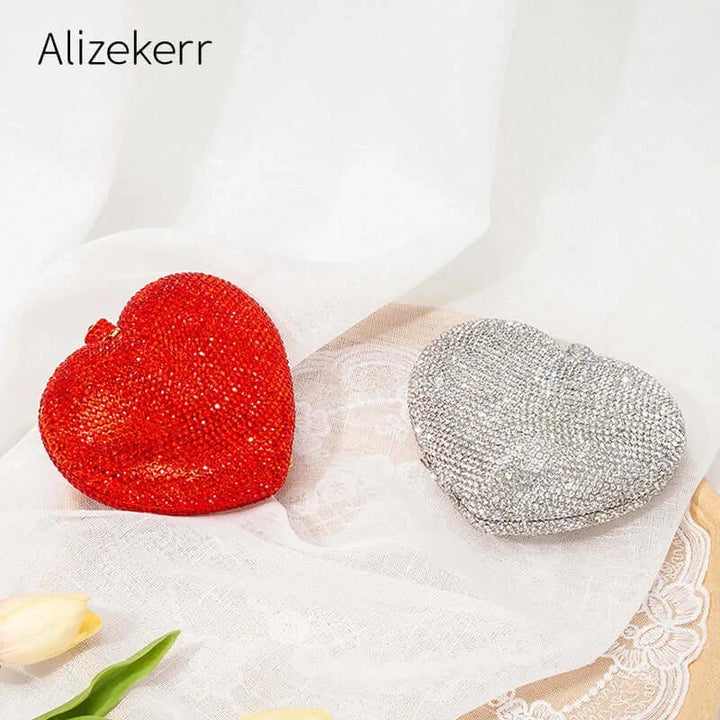 Stunning red and silver heart-shaped crystal evening clutch bags, perfect for sorority and fraternity events.