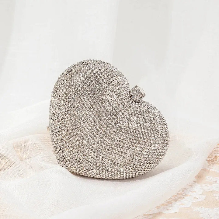 Heart shaped silver crystal evening clutch bag, perfect for sorority and fraternity events, showcasing stylish greek gear.