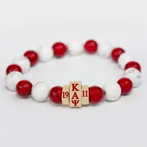 Kappa Alpha Psi beaded bracelet featuring red and white beads, perfect sorority and fraternity paraphernalia and Greek gear.