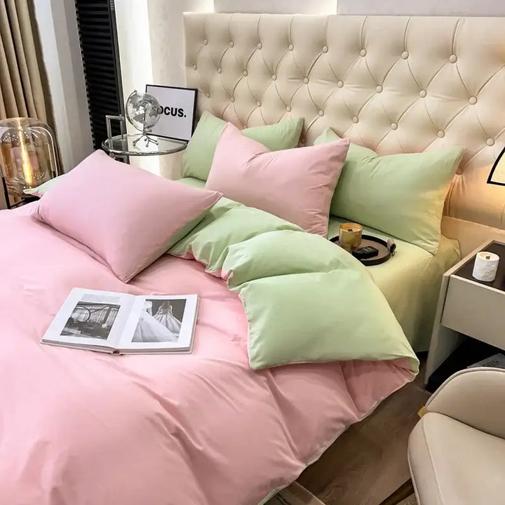 Luxurious pink and green duvet bedding set with plush pillows and stylish decor, perfect for sorority and fraternity themes.