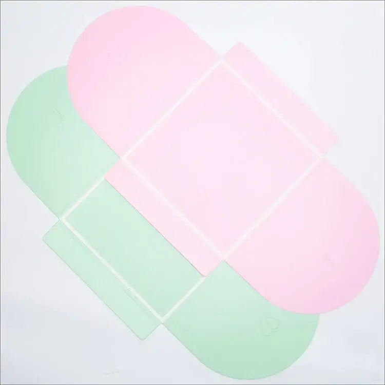 Pink and green gift boxes perfect for sorority and fraternity paraphernalia, ideal for Greek gear gifting.