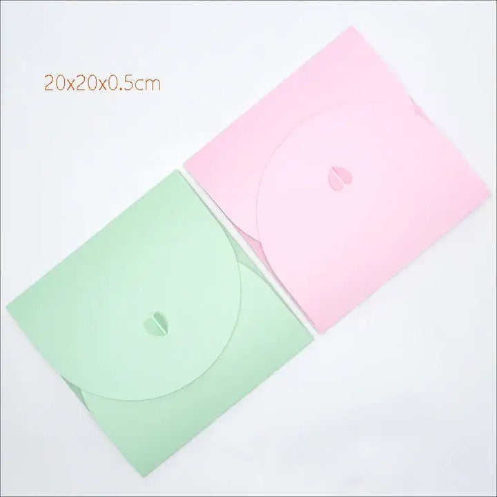 Pink and green gift boxes perfect for sorority and fraternity paraphernalia, ideal for Greek gear gifting.