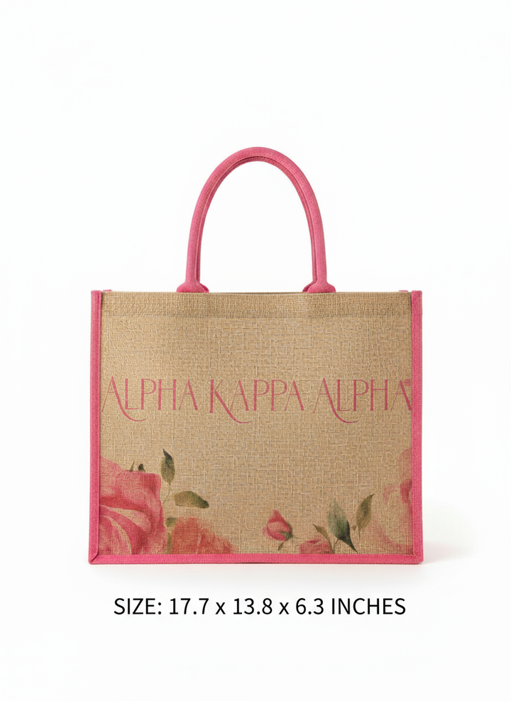 Size view of Alpha Kappa Alpha floral jute tote showing pink trim and natural jute fabric