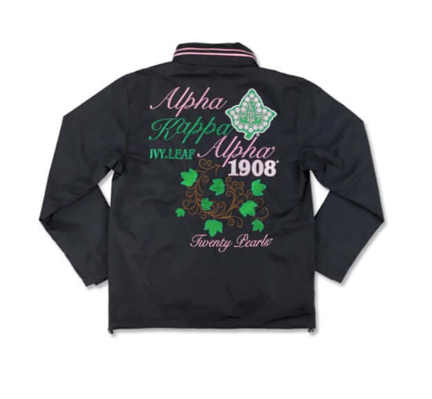 Black embroidered AKA windbreaker featuring sorority symbols and ivy leaf design, perfect for Greek gear and outdoor activities.