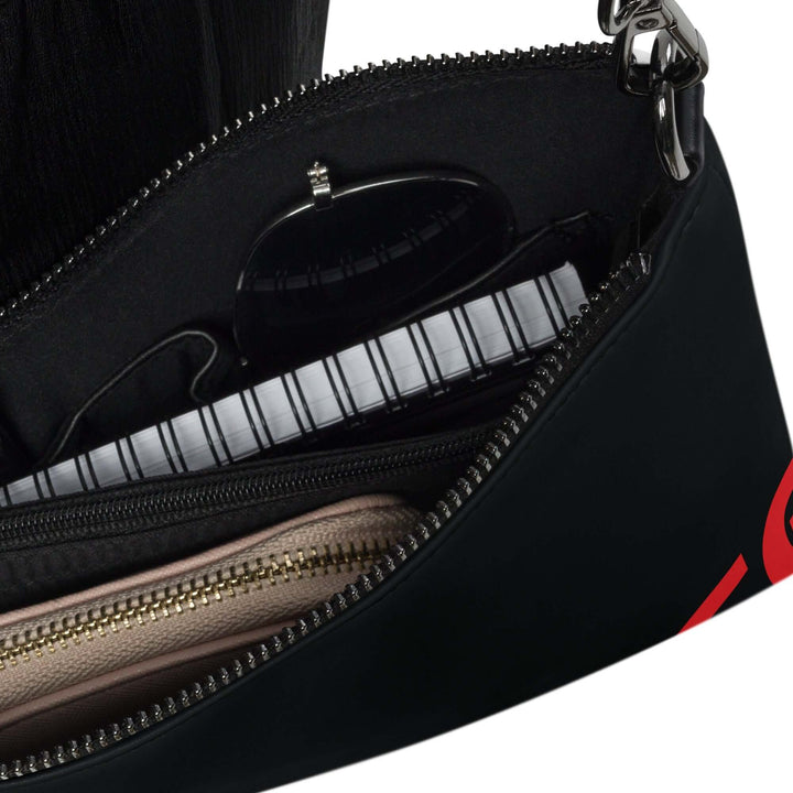 Interior view of Delta Sigma Theta Soror crossbody bag showcasing pockets and organization for essentials.