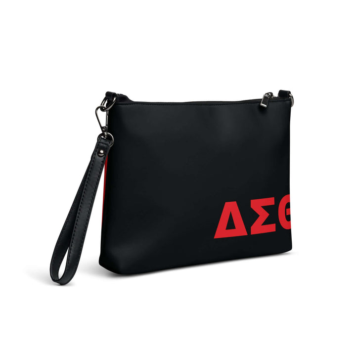 Delta Sigma Theta Sorority crossbody bag in black with red lettering, stylish and functional for sorority paraphernalia.