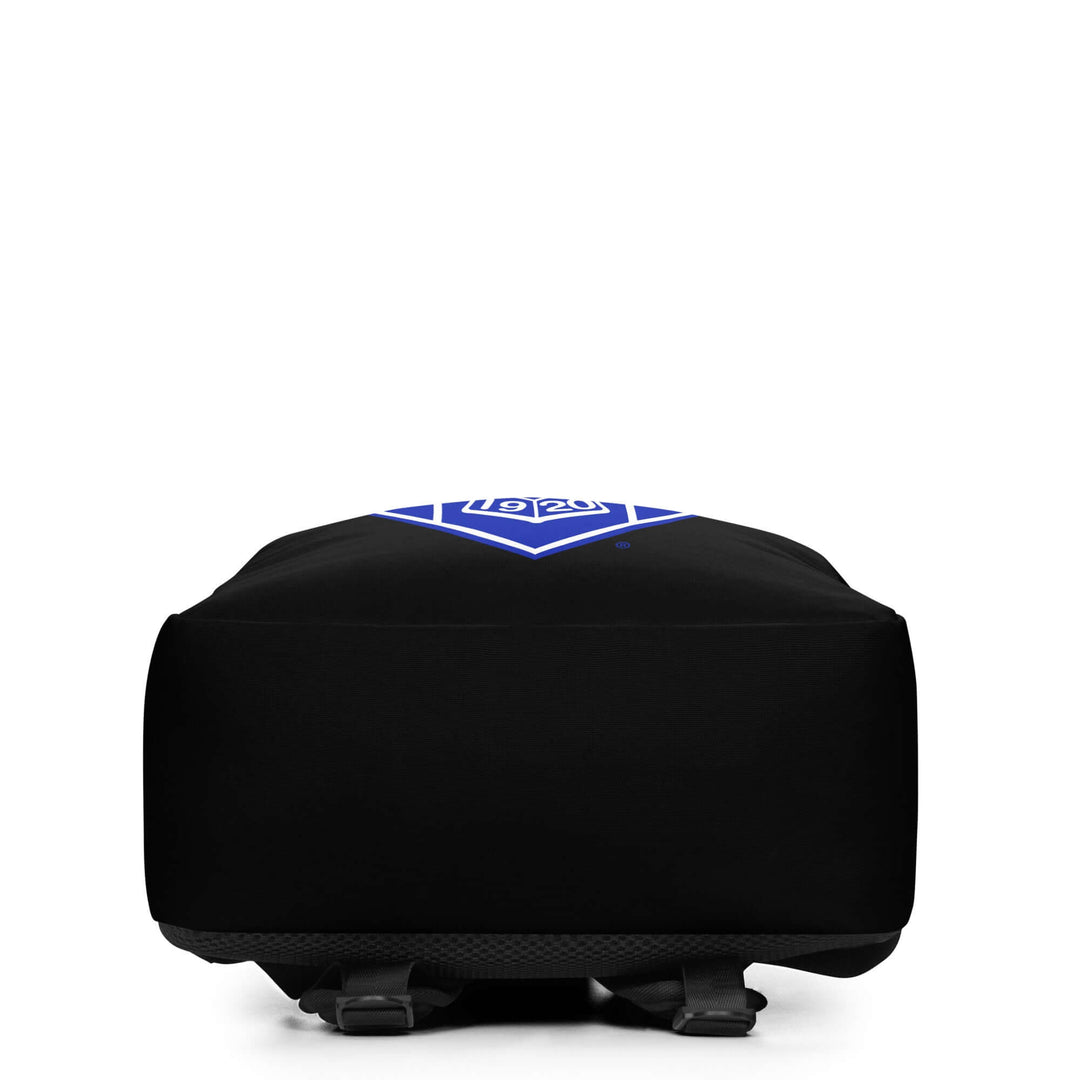 Bottom view of Zeta Crest Minimalist Backpack in black with blue logo, perfect for Greek gear and daily carry.