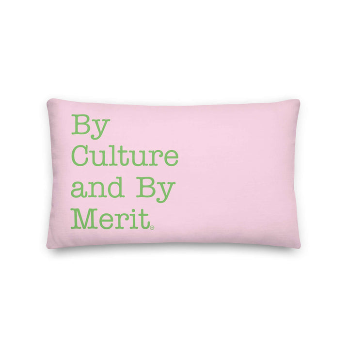 AKA sorority pillow featuring bold "By Culture and By Merit" typography in pink and green, celebrating excellence and sisterhood.