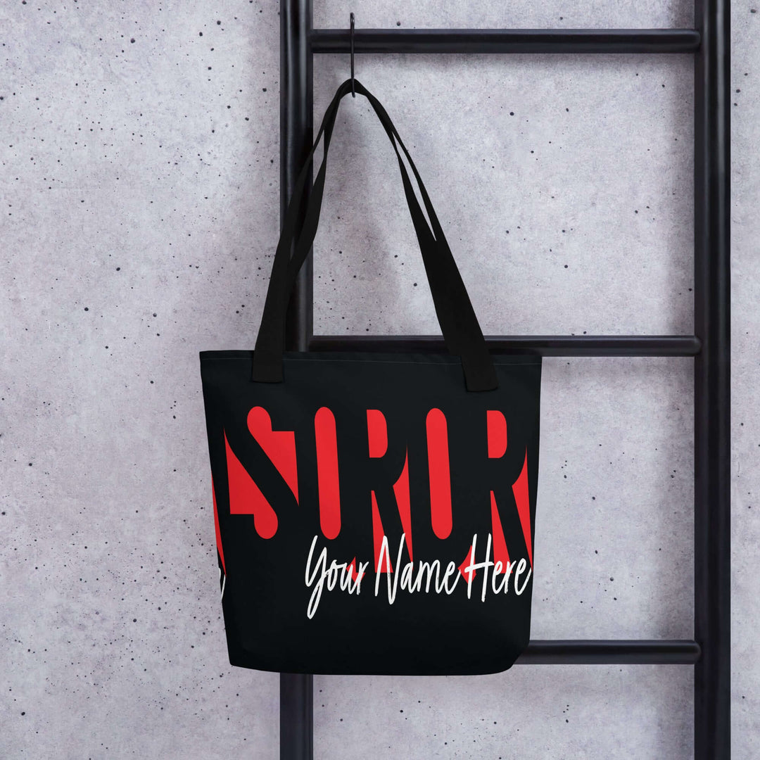 Custom Delta Sigma Theta tote bag featuring bold lettering and personalized name for sorority paraphernalia.