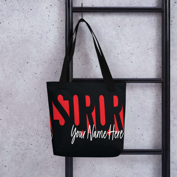 Custom Delta Sigma Theta tote bag featuring bold lettering and personalized name for sorority paraphernalia.