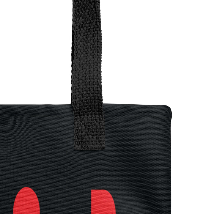 Close-up of the black handle and fabric of the Delta Custom Soror Tote Bag, showcasing durability and style for sorority life.