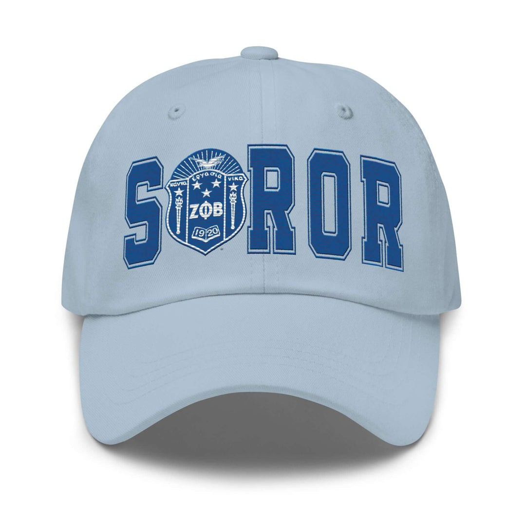 Zeta Phi Beta Soror hat in light blue, featuring bold "SOROR" letters and emblem, perfect for Greek gear and sorority pride.