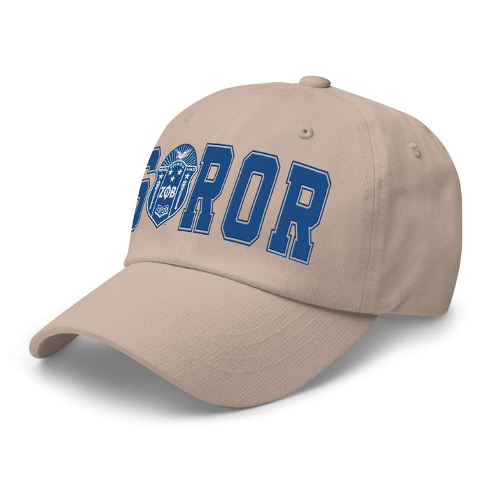 Zeta Soror Hat featuring blue embroidered letters on beige fabric, perfect Greek gear for sorority members.