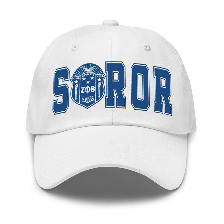 Zeta Soror hat in white featuring blue embroidered letters and logo, perfect for sorority and fraternity paraphernalia.
