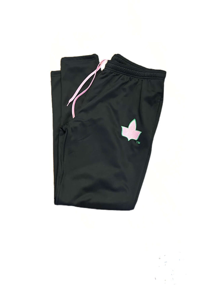 AKA jogging pants in black with pink drawstrings, perfect Greek gear for sorority members on the move.