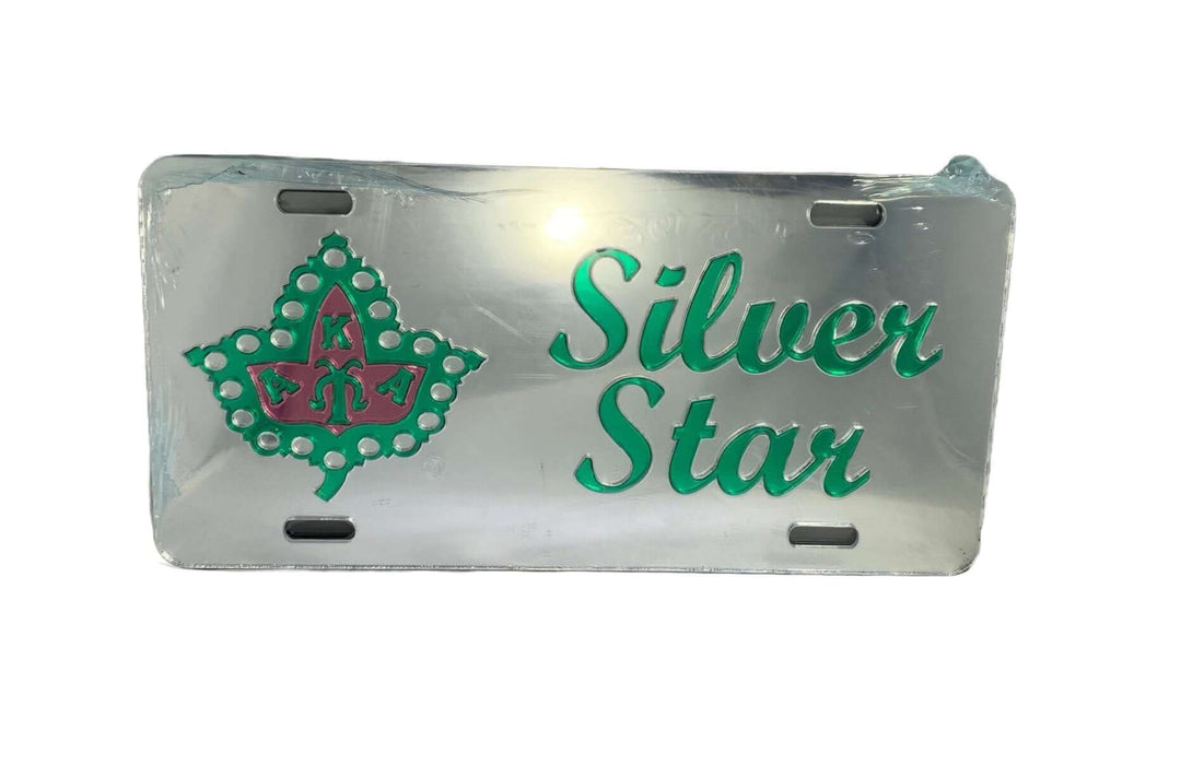 Silver Star car tag featuring a green emblem, perfect for AKA sorority members and Greek gear enthusiasts.