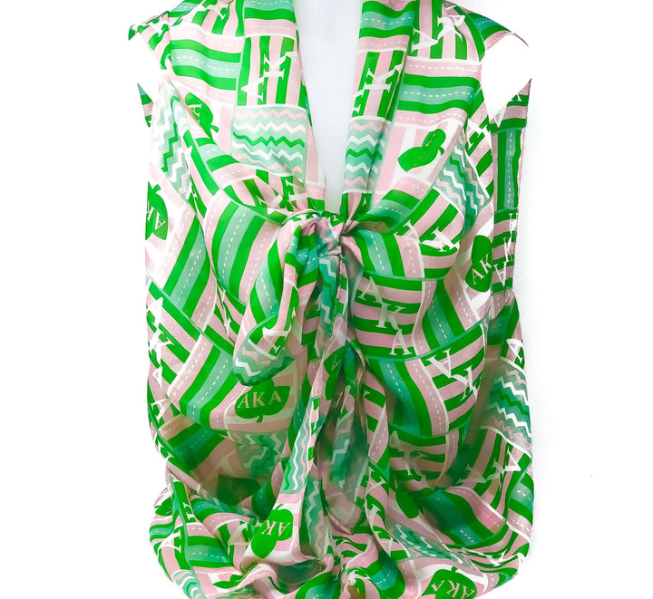 AKA Transforming Scarf featuring vibrant green and pink patterns, perfect for sorority and fraternity pride as stylish Greek gear.