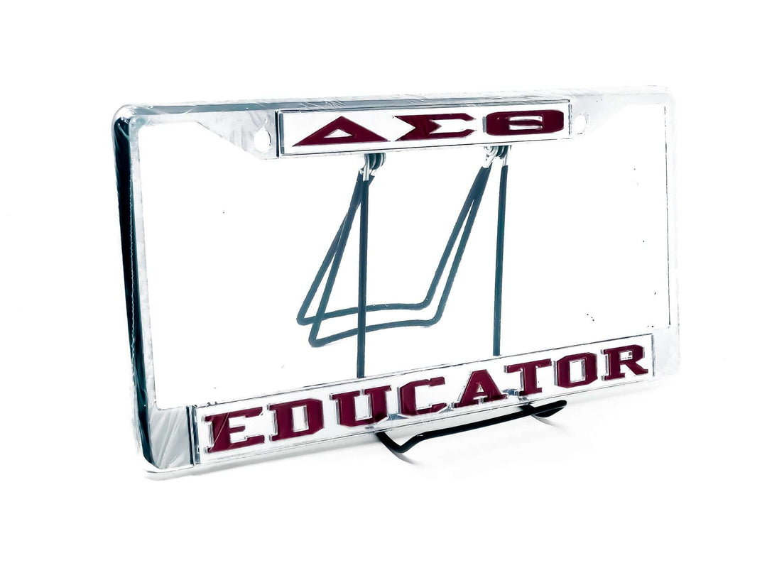 Delta Sigma Theta car tag frame with "EDUCATOR" design, reflecting sorority pride and academic excellence. Perfect Greek gear accessory.