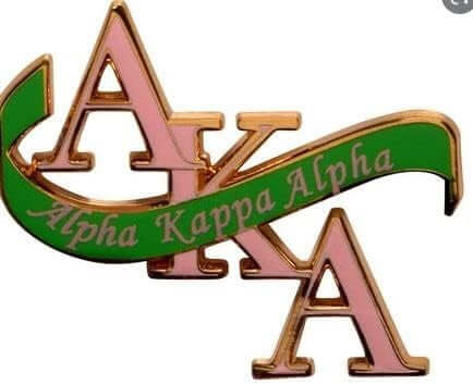 AKA symbol pin featuring Alpha Kappa Alpha letters and scroll design, perfect for sorority and fraternity paraphernalia.