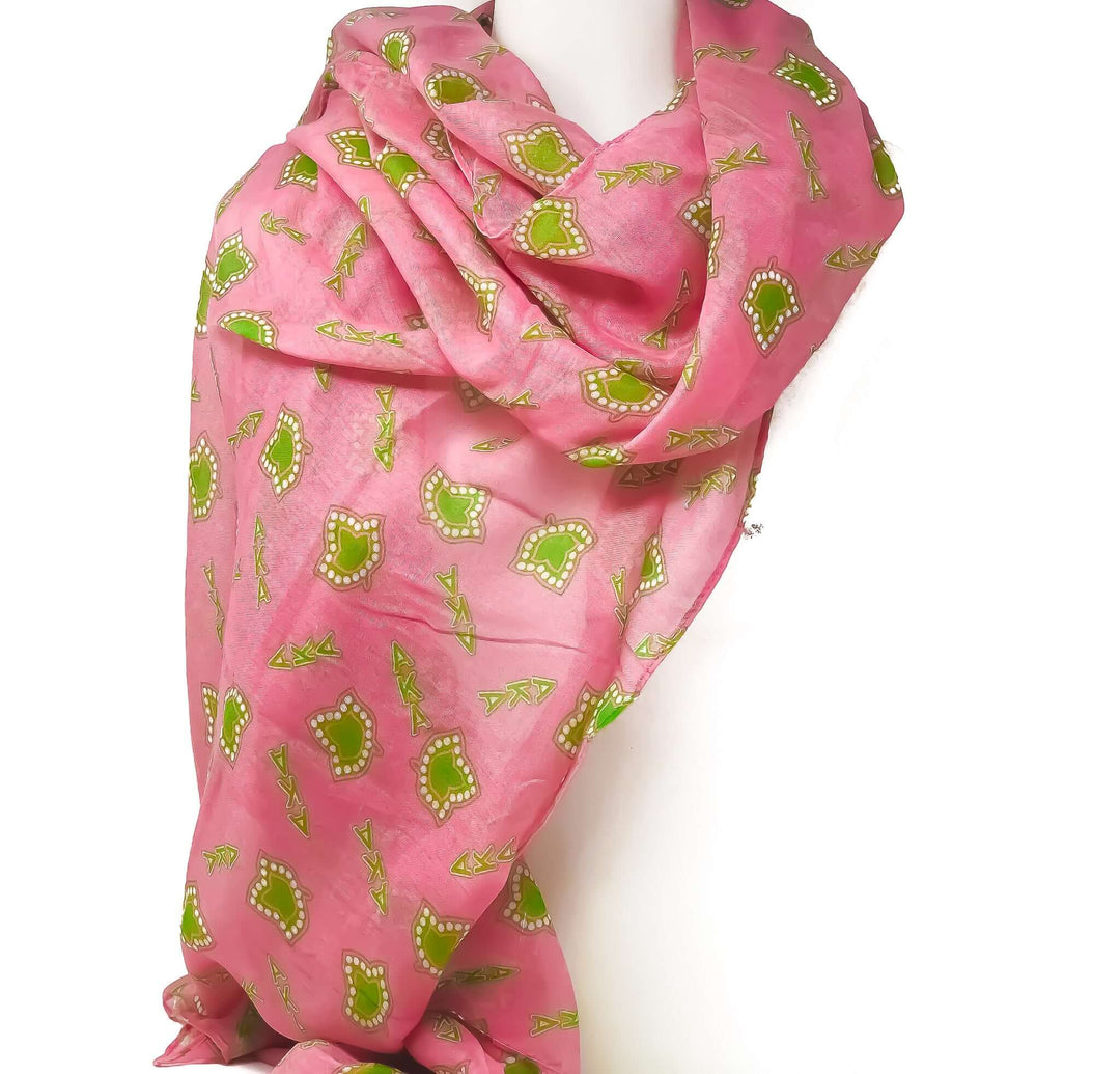 AKA Feather Light Scarf in pink and green, featuring a delicate feather pattern, perfect Greek gear for sorority pride.