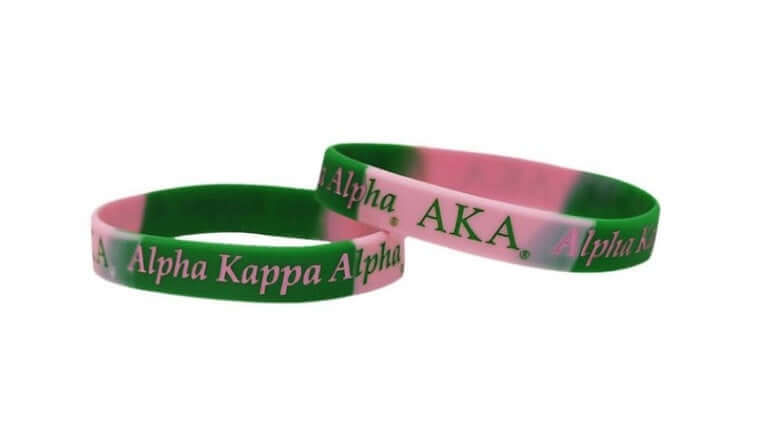 AKA Silicone bracelets featuring Greek letters in sorority colors, perfect for fraternity paraphernalia and Greek gear.