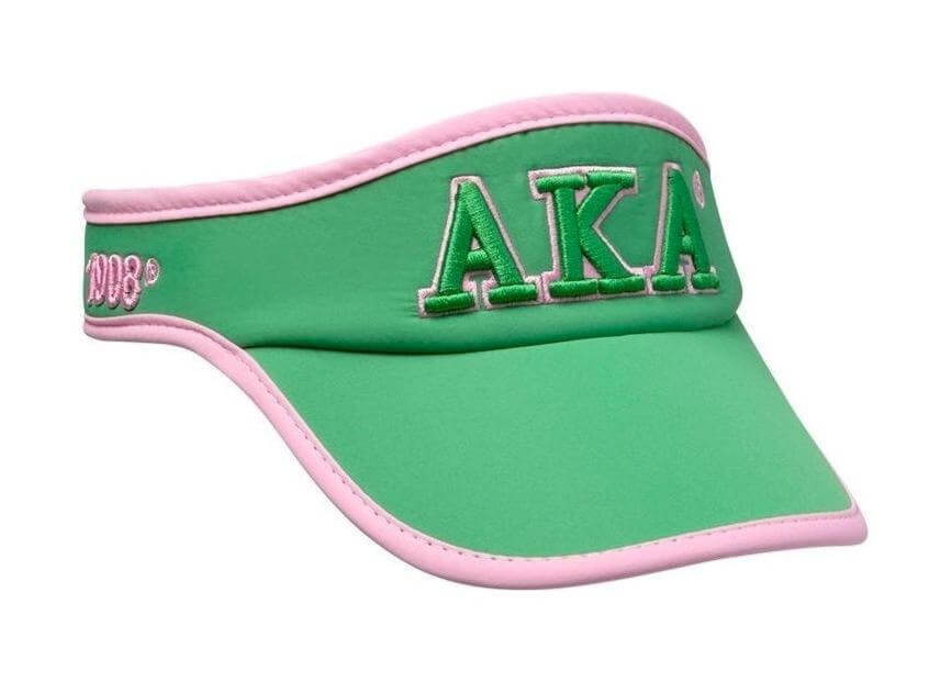 AKA Sun Visor in green and pink, showcasing Greek letters, stylish sorority paraphernalia for sun protection.