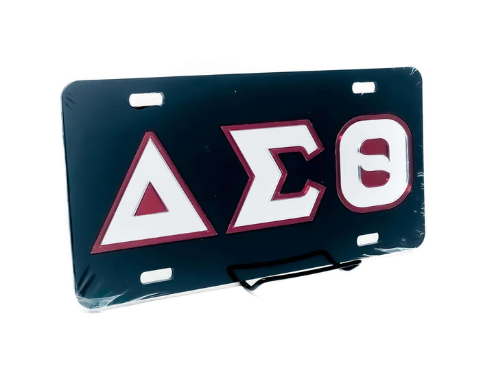 Delta Sigma Theta car tag showcasing Greek letters on a stylish black background, perfect for sorority pride and fraternity paraphernalia.
