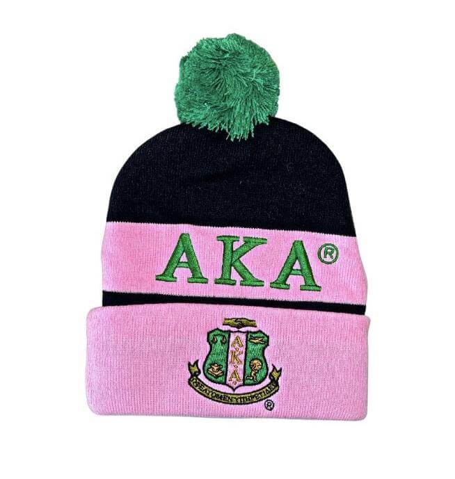 Cozy AKA Knit Beanie in pink and black with pom-pom, featuring iconic Greek letters and sorority crest, perfect Greek gear accessory.