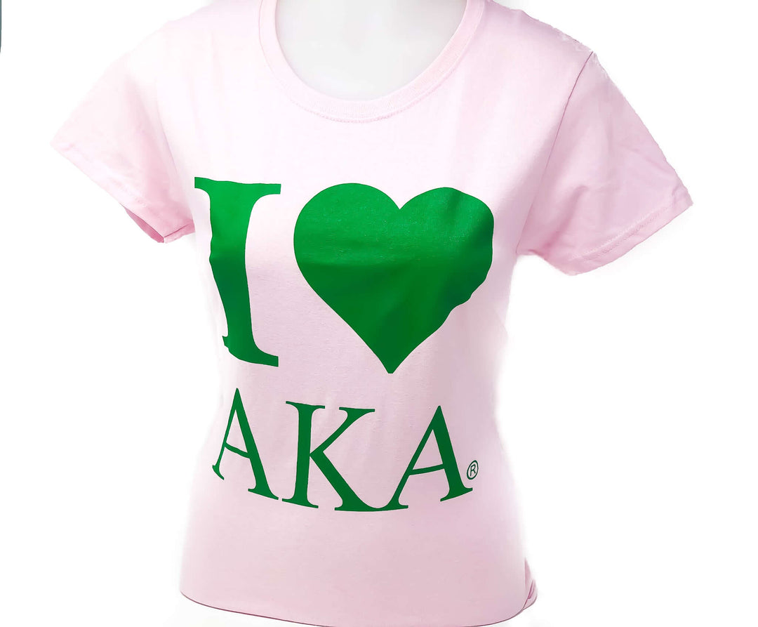 Ladies cut pink AKA T-Shirt featuring 'I Heart AKA' design, perfect sorority paraphernalia and Greek gear for proud members.