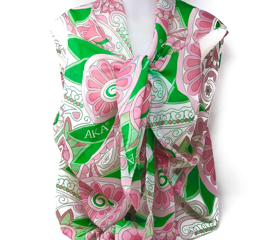 AKA Transforming Scarf featuring vibrant green and pink design, perfect for sorority and Greek gear style.
