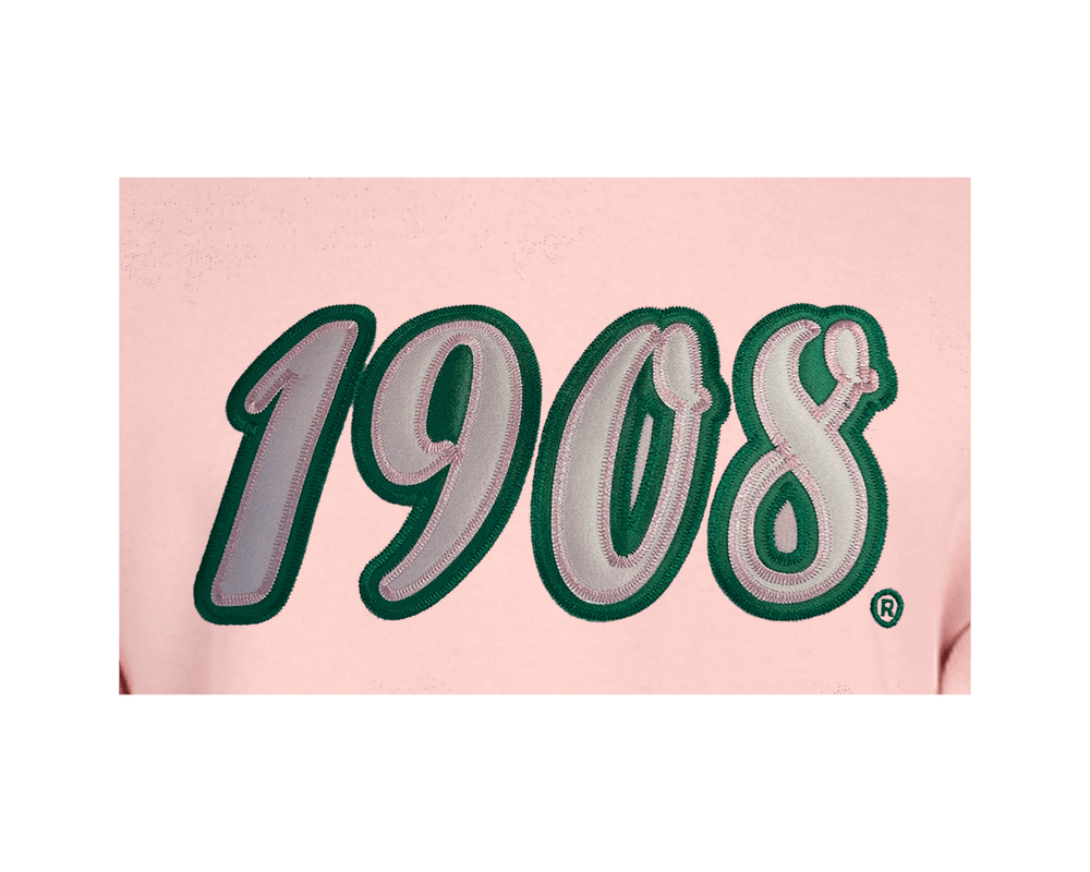 Close-up of the pink chenille "1908" embroidery with green border on fraternity sorority sweatshirt, showcasing Greek gear style.