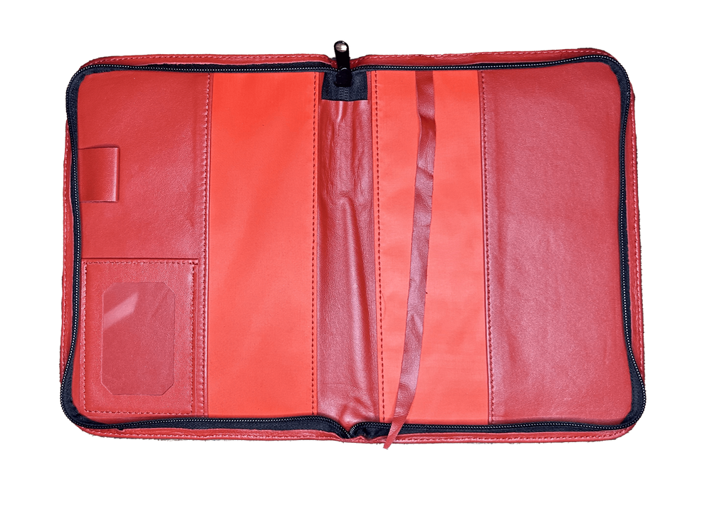 Inside view of Delta Ritual cover featuring pockets, pen holder, and bookmark for sorority and fraternity paraphernalia.