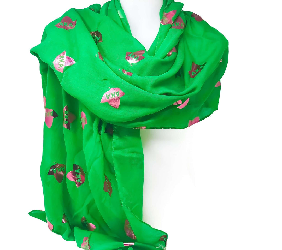 AKA Foil Scarf Wrap in green and pink, a stylish sorority accessory symbolizing unity and sisterhood.