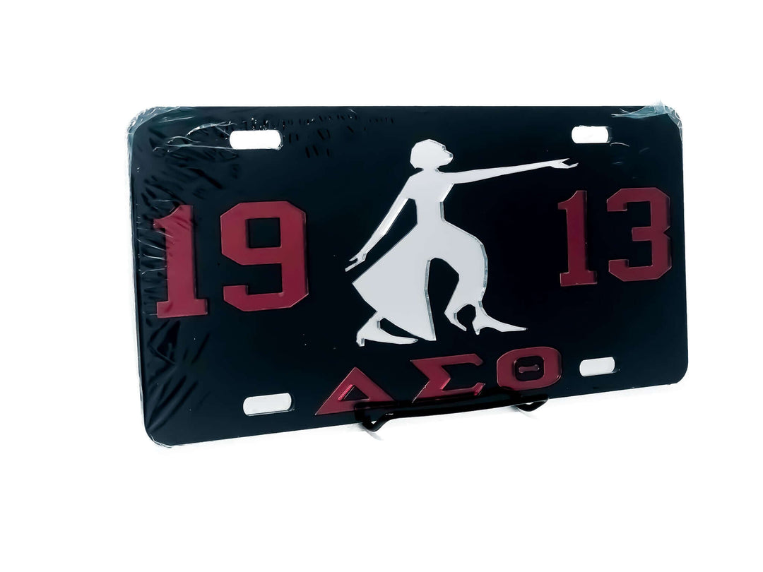 Delta Sigma Theta car tag featuring iconic sorority symbol and colors, perfect Greek gear for proud members.