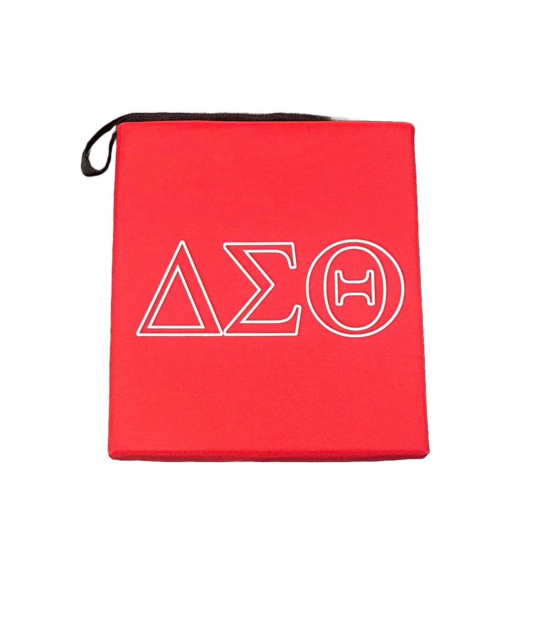 Delta Stadium Seat in red with white letters, perfect sorority and fraternity gear for events, measuring 13x15x2 inches.