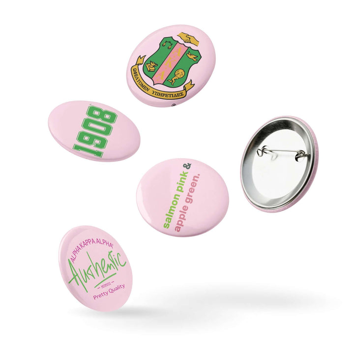 AKA Pink Pin Button Set featuring sorority designs, perfect for Greek gear and paraphernalia, etched in glossy finish.