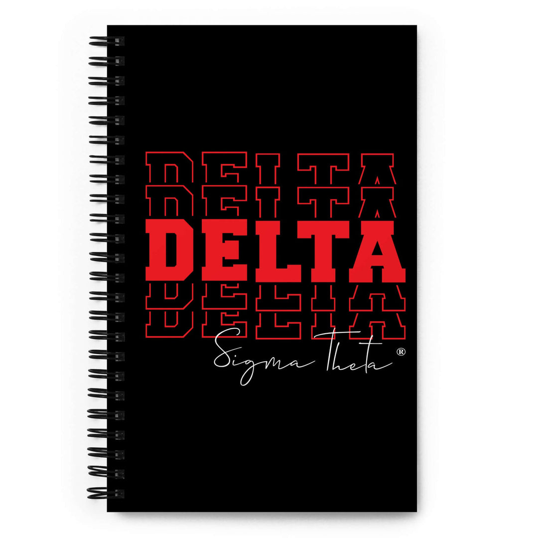 Delta Sigma Theta sorority spiral notebook with bold red lettering on a black cover, perfect for Greek gear and paraphernalia.
