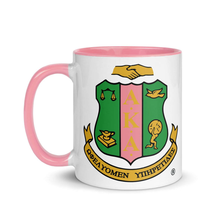 AKA Crest Mug with pink handle and interior, perfect for sorority and fraternity paraphernalia and Greek gear.