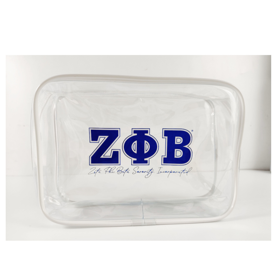 Zeta Phi Beta clear cosmetic bag with ΖΦΒ lettering and white trim, TSA-approved size by A&W Greek Shop.