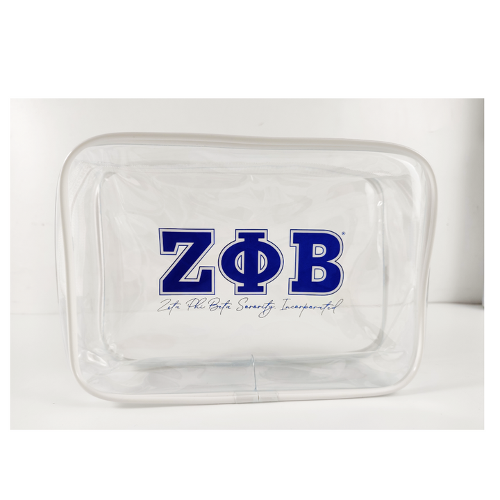 Zeta Phi Beta clear cosmetic bag with ΖΦΒ lettering and white trim, TSA-approved size by A&W Greek Shop.