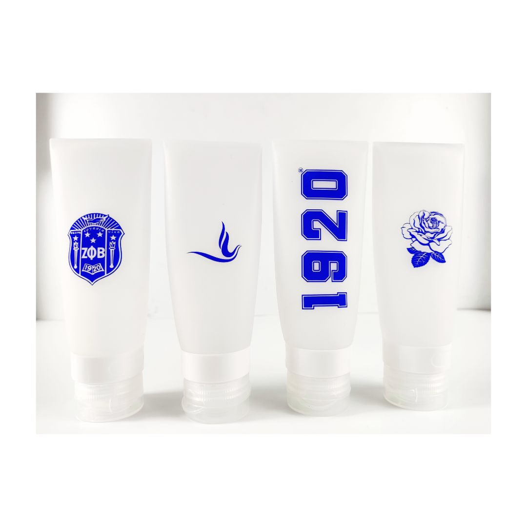 Zeta Phi Beta clear cosmetic travel set with ΖΦΒ logo bag and four TSA-approved bottles by A&W Greek Shop.
